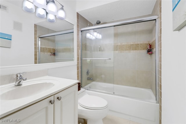 full bathroom with toilet, a textured ceiling, combined bath / shower with glass door, and vanity