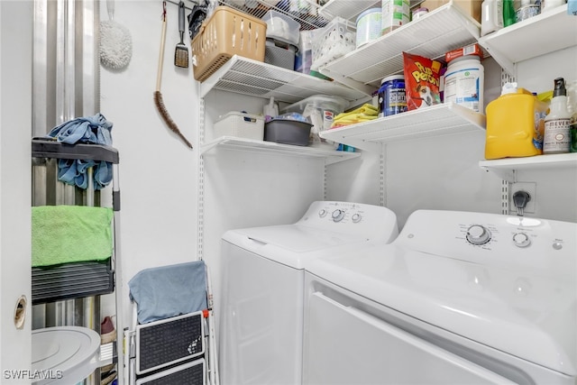 laundry room featuring washing machine and clothes dryer