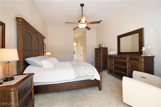 bedroom featuring ceiling fan and light colored carpet