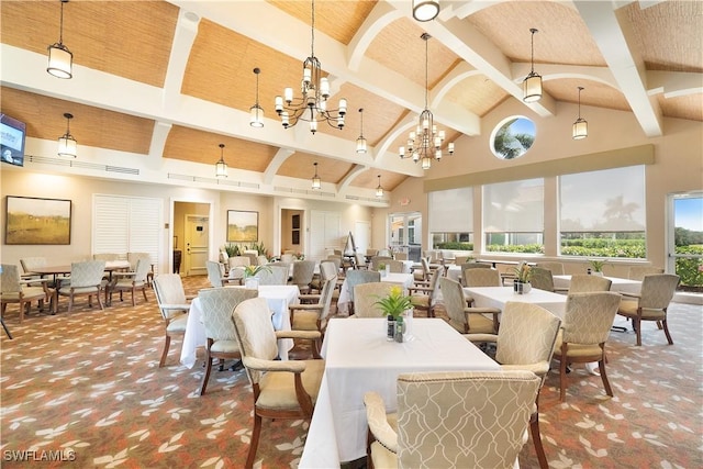 carpeted dining space with beam ceiling, high vaulted ceiling, and a chandelier