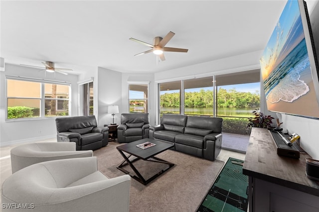 living room featuring ceiling fan