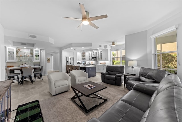 living room featuring ceiling fan