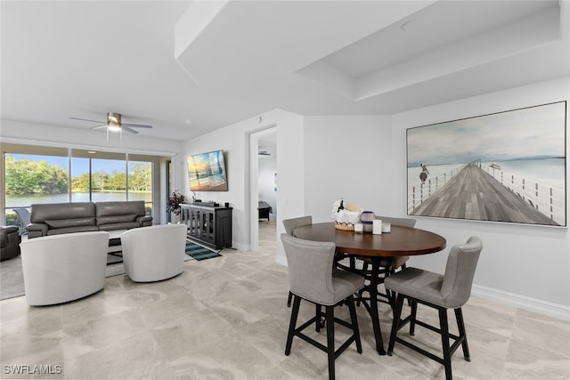 dining room with ceiling fan