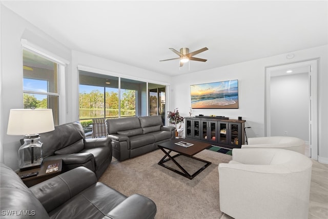 living room featuring ceiling fan