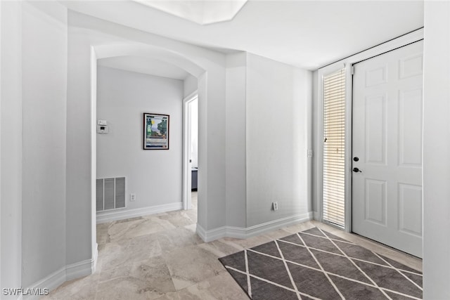 foyer entrance featuring plenty of natural light