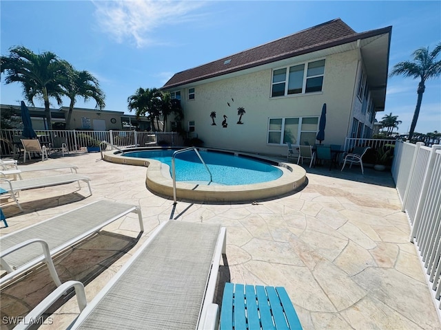 view of pool with a patio area