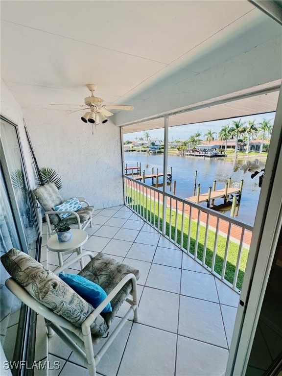 balcony featuring a water view