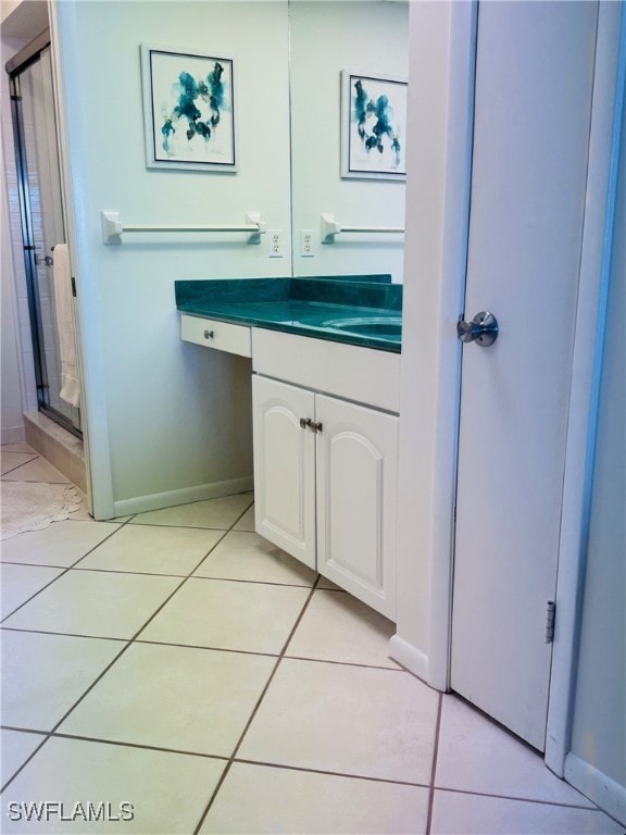 bathroom with vanity and tile patterned floors