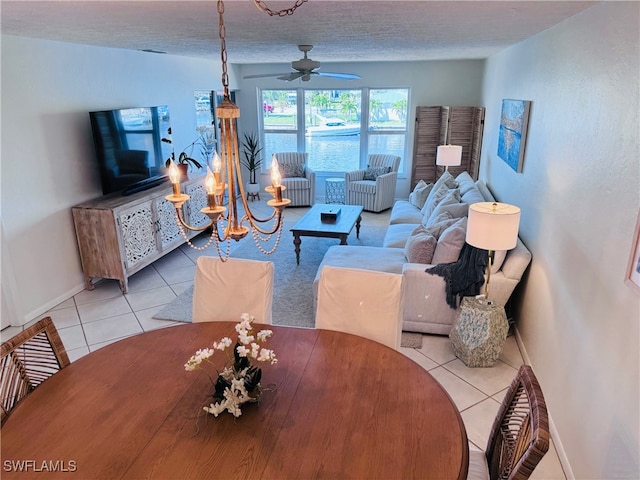 interior space featuring ceiling fan and a textured ceiling