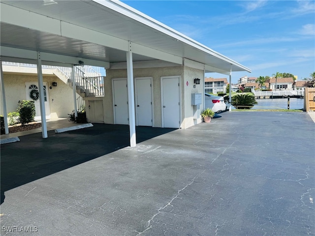 view of car parking featuring a carport