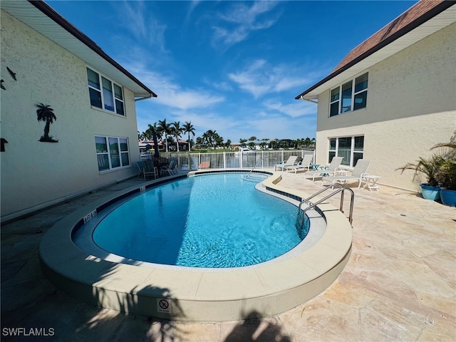 view of pool with a patio