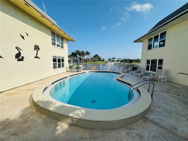 view of pool with a patio area