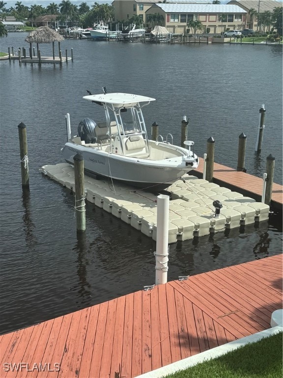 view of dock with a water view