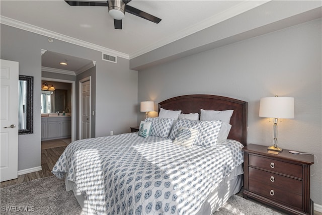 bedroom featuring wood-type flooring, connected bathroom, crown molding, and ceiling fan