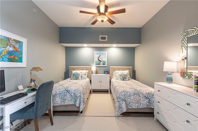 carpeted bedroom featuring ceiling fan