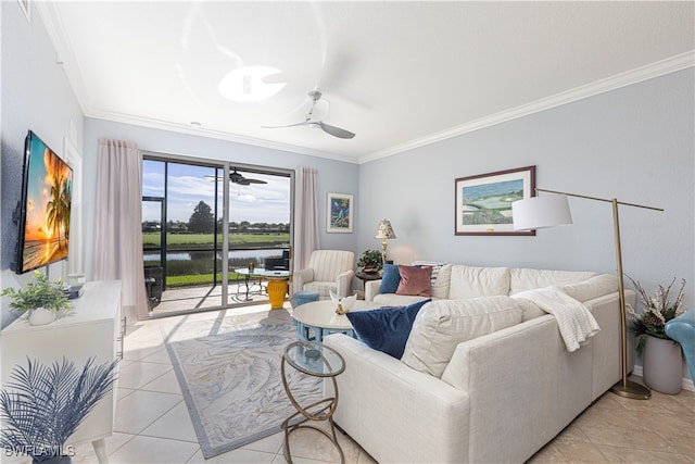 tiled living room with crown molding, ceiling fan, and a water view