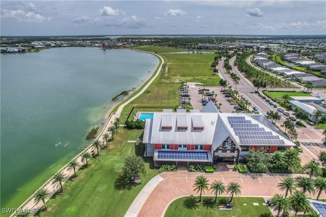 bird's eye view with a water view