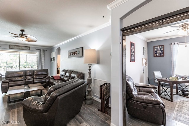 living room with crown molding, hardwood / wood-style flooring, and ceiling fan