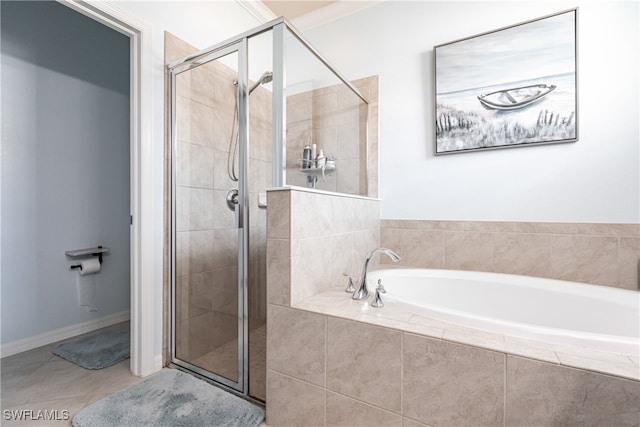 bathroom featuring tile patterned floors and plus walk in shower