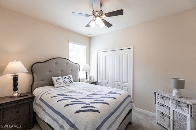 bedroom featuring carpet floors, ceiling fan, and a closet