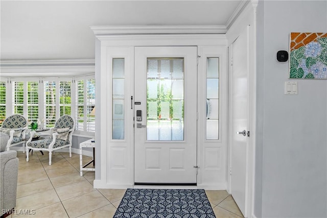 doorway featuring light tile patterned flooring and crown molding