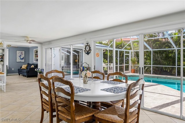 dining area featuring light tile patterned floors