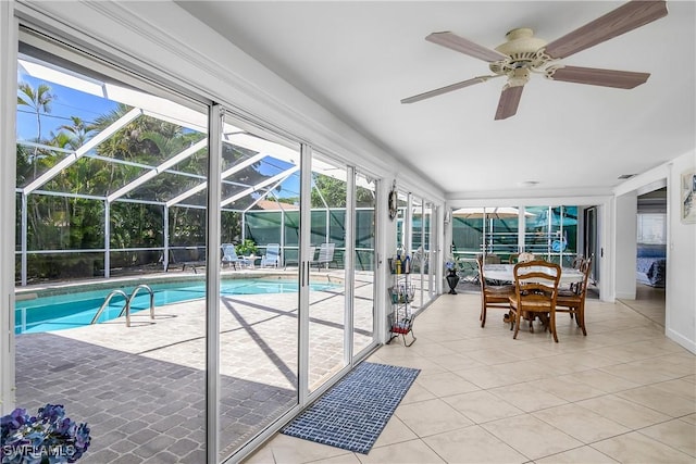 sunroom with a swimming pool