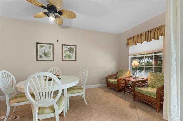 dining room with ceiling fan and light tile patterned floors