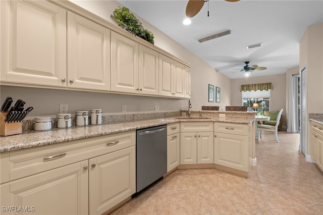 kitchen with cream cabinetry, ceiling fan, sink, and stainless steel dishwasher