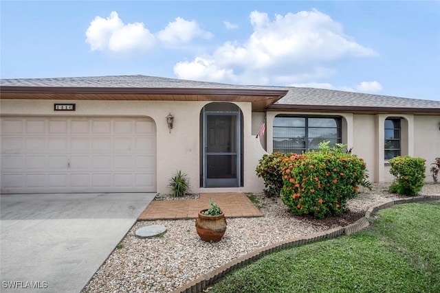 ranch-style home with a garage