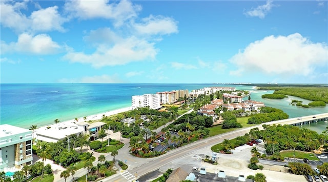 bird's eye view with a view of the beach and a water view