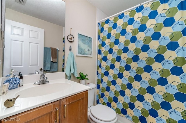 9025 Colby Dr Unit 2120, Fort Myers, FL 33919 - bathroom featuring vanity, toilet, and curtained shower