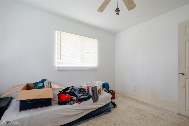 interior space featuring ceiling fan