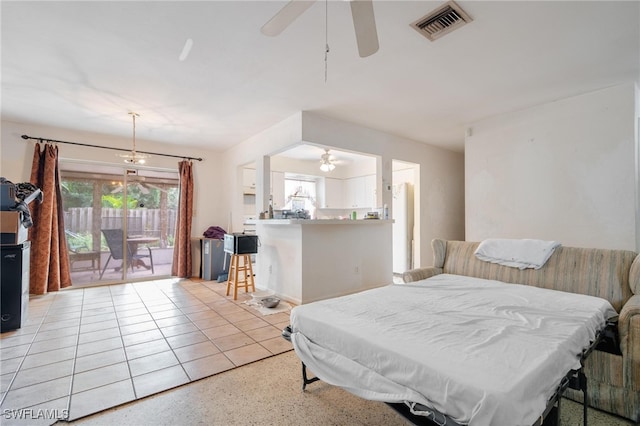 bedroom featuring access to outside, multiple windows, and ceiling fan