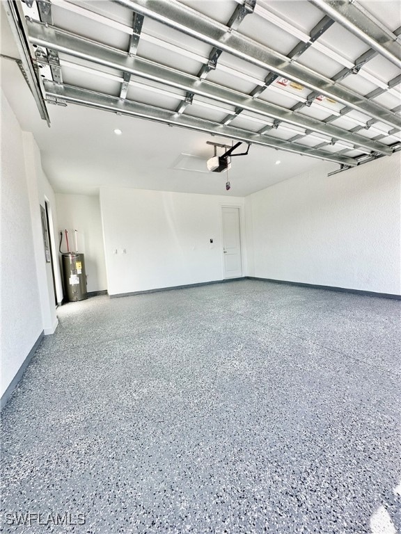 garage featuring a garage door opener and water heater