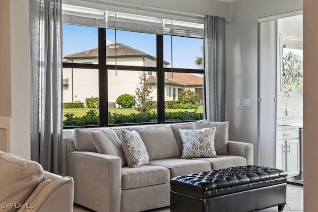 living room with light tile patterned floors