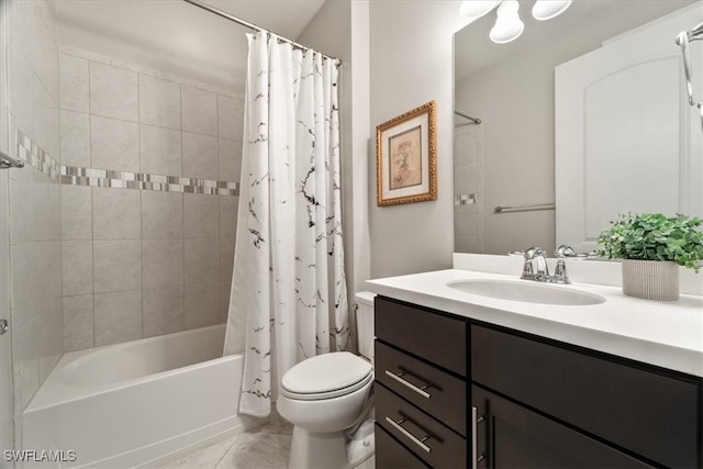 full bathroom featuring shower / tub combo with curtain, vanity, toilet, and tile patterned flooring