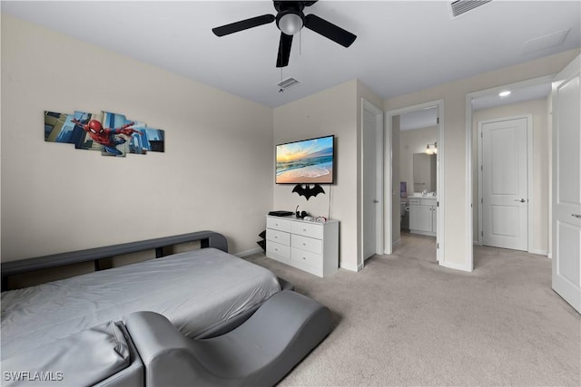 carpeted bedroom featuring ceiling fan and connected bathroom