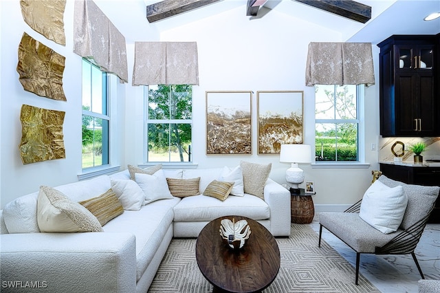 interior space with lofted ceiling with beams