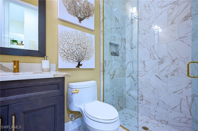 bathroom with toilet, a shower with shower door, and vanity