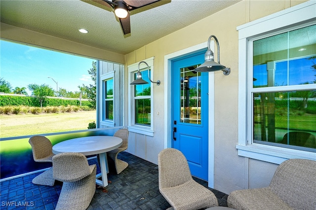 view of patio / terrace with ceiling fan