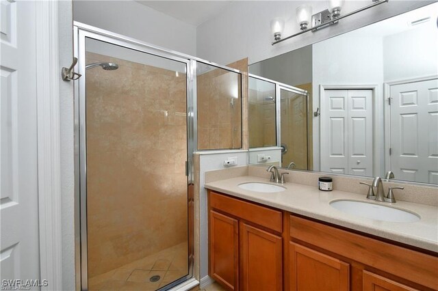 bathroom featuring vanity and walk in shower