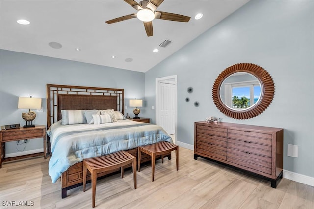 bedroom with light wood-style floors, baseboards, and recessed lighting