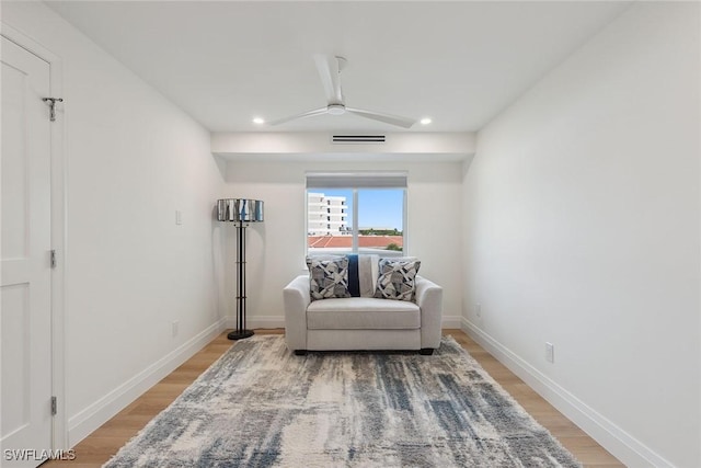 living area with visible vents, recessed lighting, baseboards, and light wood-style floors