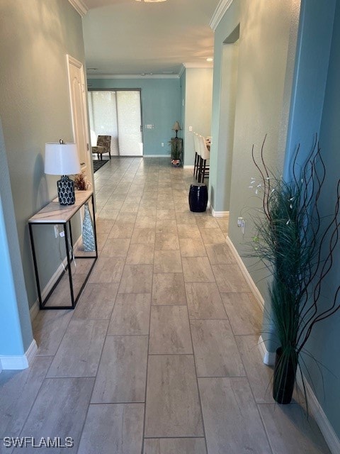 hallway featuring crown molding