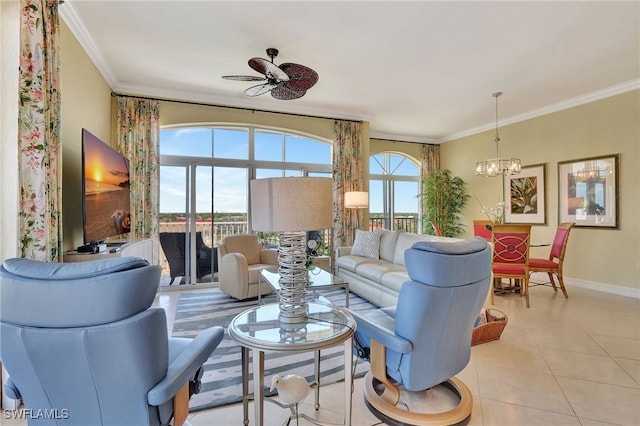 living room with crown molding, ceiling fan with notable chandelier, and light tile patterned flooring