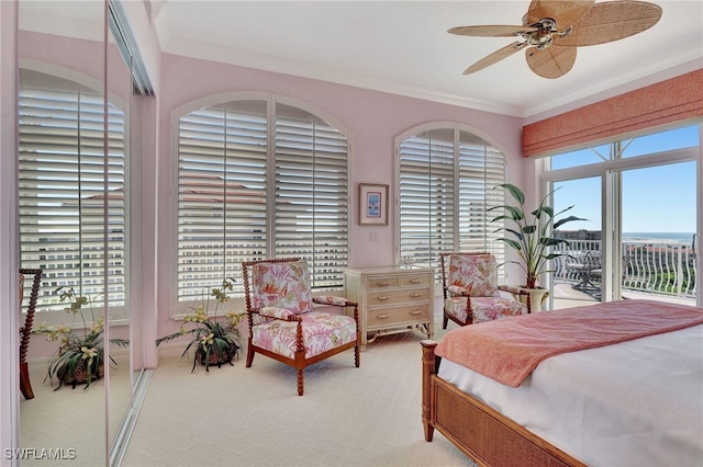 bedroom featuring light carpet, access to exterior, ornamental molding, and ceiling fan