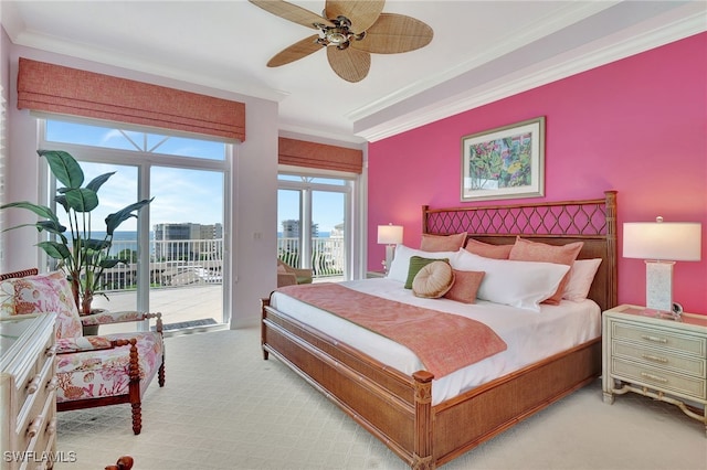 carpeted bedroom featuring ornamental molding, access to outside, and ceiling fan