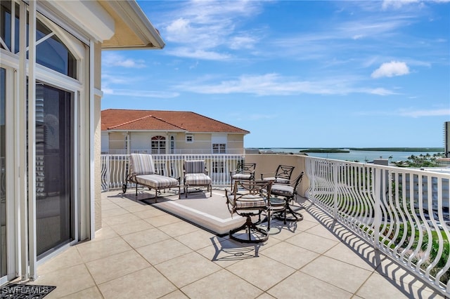 view of patio / terrace with a water view