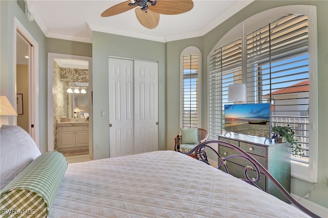 bedroom featuring ornamental molding, connected bathroom, and ceiling fan